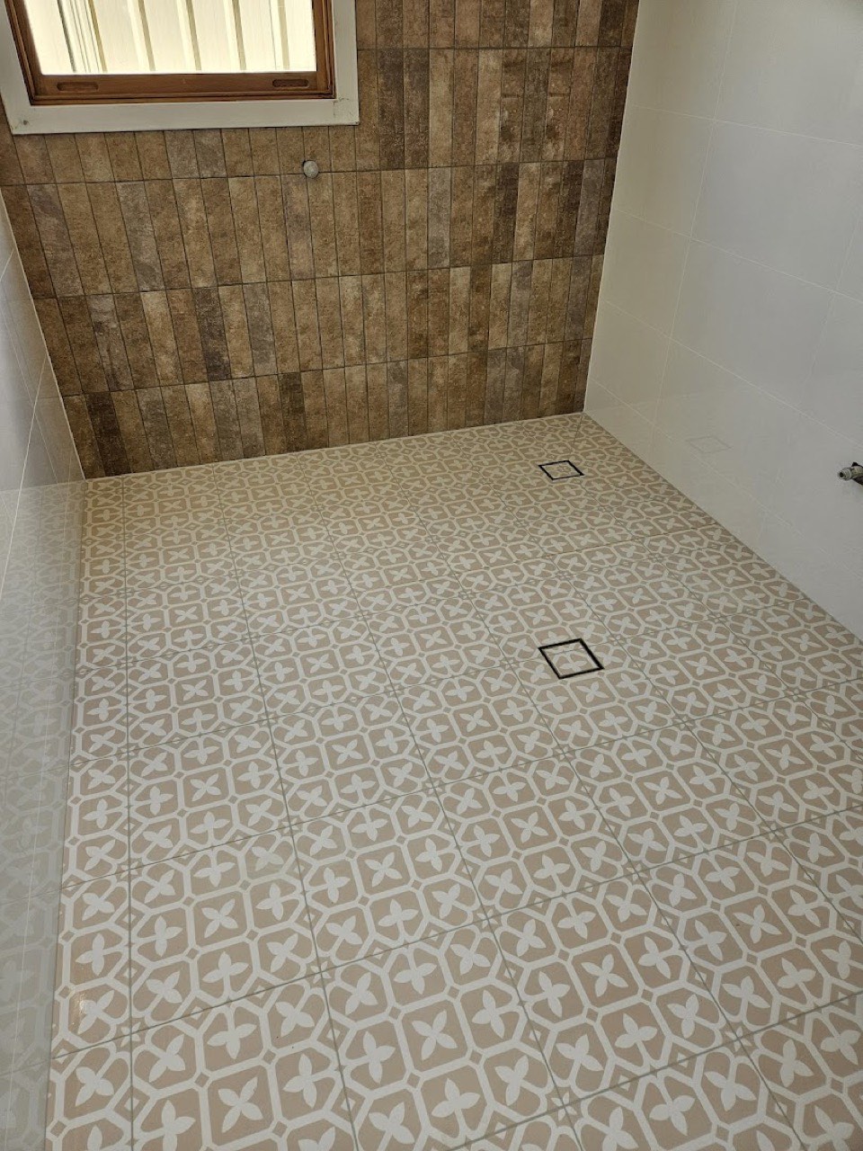 A real patterned floor tiling job by Axent Tiling